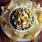 This Colorful Corn Salsa is a snap to make and will be a hit with your friends and family. It's the perfect take along to summer barbecues. It's as tasty as it is pretty and you won't have any leftovers!