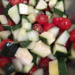 This Cherry Tomato Cucumber Salad would be great to have for Memorial Day.  It is easy to throw together and travels well.  It also has some fun things in the salad like zucchini and oregano.  Mmmm.  The fresh veggies are such a welcome thing to bite into in the spring.