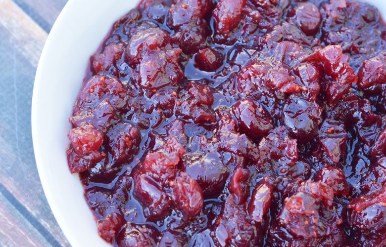 Make your holiday pop with this tangy Homemade Cranberry Sauce!   I absolutely love using fresh cranberries to make sauces and this homemade cranberry sauce is so yummy as any side dish.  Don't be scared to try making this with fresh berries, it is so easy and so tasty.